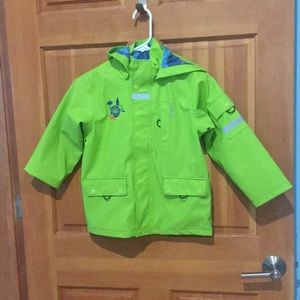 Kamik brand kids lime green rain jacket.